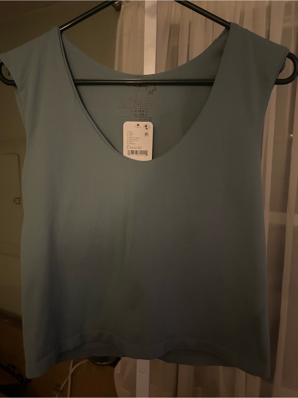 Free People Sleeveless Scoop Neck Tank Top in mineral blue